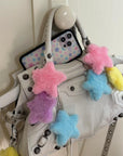Lifestyle Image 02 Purple Fluffy Star Charm