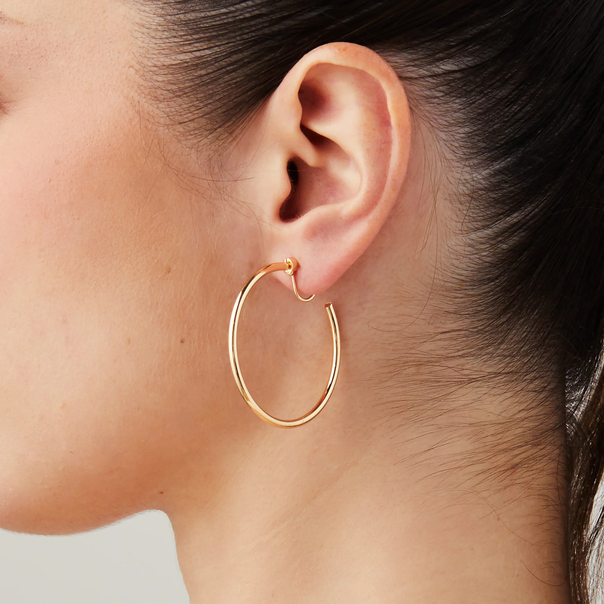 Aiori - Large Thin Hoop Clip On Earrings - Gold Rotating Invisible Resin -